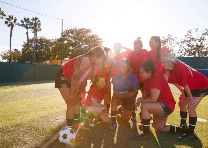 Groß (coach-with-digital-tablet-discussing-tactics-with-2024-10-22-06-12-33-utc)