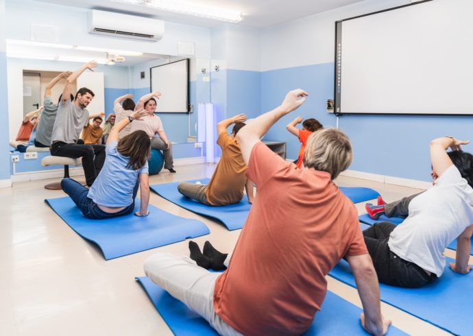 Groß (group-of-people-with-disabilities-enjoying-a-yoga-2025-03-06-05-26-57-utc)